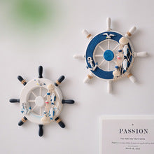Mediterannean Style Photo Wall with Wooden Crafts Ship's Wheel